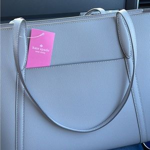 Brand new Kate spade tote bag , never been used , still in original packaging